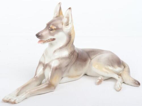 A 1920’s Allach style porcelain dog, by Karner