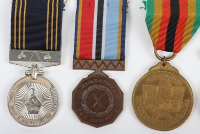 An Interesting Double Long Service Medal Group of 5 to a Sergeant in the Rhodesian Police Force who Continued to Service in the Zimbabwe Forces after Independence - 3