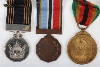 An Interesting Double Long Service Medal Group of 5 to a Sergeant in the Rhodesian Police Force who Continued to Service in the Zimbabwe Forces after Independence - 5