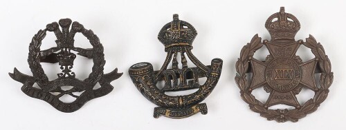 Grouping of Bronzed British Military Officer's Service Dress Cap Badges to Territorial Regiments.