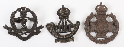 Grouping of Bronzed British Military Officer's Service Dress Cap Badges to Territorial Regiments.