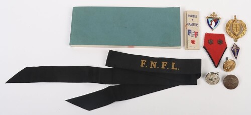 Free French Insignia Grouping, Including a Rare, Free French Navy 'La Combattante' pin badge.