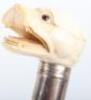 ^An early 20th century silver and ivory walking stick, William Hutton & Sons Ltd, Birmingham 1916 - 6