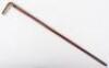 An Edwardian walking stick with spirit level (lacking liquid) and scaled ruler, with horn handle