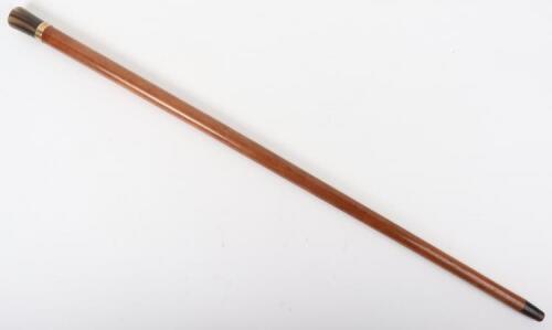 An early 20th century 12ct gold and horn walking cane