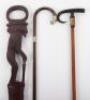 An African carved hardwood walking stick showing snake and elder man - 4