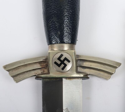Third Reich DLV / NSFK Flyers Dagger by David Malsch, excellent example of a DLV / NSFK flyers knife with nickel silver fittings. Blue leather covering to the grip and scabbard. Short leather hanging strap attached to the scabbard. Nice patina to the exte - 4