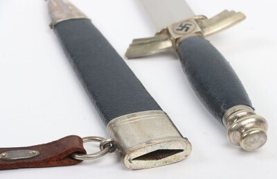Third Reich DLV / NSFK Flyers Dagger by David Malsch, excellent example of a DLV / NSFK flyers knife with nickel silver fittings. Blue leather covering to the grip and scabbard. Short leather hanging strap attached to the scabbard. Nice patina to the exte - 7