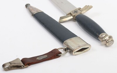 Third Reich DLV / NSFK Flyers Dagger by David Malsch, excellent example of a DLV / NSFK flyers knife with nickel silver fittings. Blue leather covering to the grip and scabbard. Short leather hanging strap attached to the scabbard. Nice patina to the exte - 8