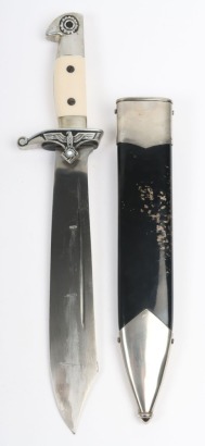 Third Reich TENO (Technische Nothilfe) Enlisted Mans Dress Dagger by Carl Eickhorn, Solingen, good example with two white celluloid grip plates, eagle head pommel top and cross guard with the original eagle and TENO emblem. Housed in the original blackene