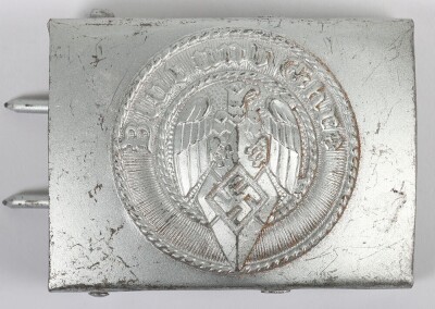 Third Reich Hitler Youth (Hitler Jugend) Belt Buckle by F.W. Assmann & S&ouml;hne, L&uuml;denscheid, stamped steel construction with central HJ eagle and diamond surrounded by the motto &ldquo;Blut und Ehre&rdquo;. Complete rarely encountered Assmann reverse set-up with integr - 2