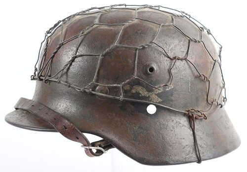 WW2 German Luftwaffe M40 Camouflaged Helmet with Wire Basket.