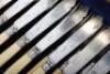An early 20th century silver plate and bone handle fish knife and fork set for twelve - 4