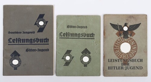 Grouping of 3 Third Reich Hitler Youth (Hitlerjugend) Proficiency Award Booklets and a Cloth RZM Proficiency Badge