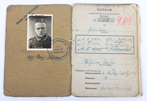 WW2 German Soldbuch to Feldwebel Wilhelm Fultz, Kfz.-Instandsetzungs-Kompanie 153 Kurland 1945