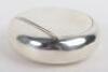 A Victorian silver circular &lsquo;squeeze&rsquo; sided box, London 1867 - 2
