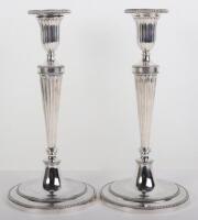 A pair of Victorian silver candlesticks, London 1880, Martin Hall & Co