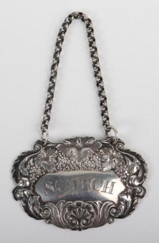 A silver &lsquo;Scotch&rsquo; wine label, Holland, Aldwinckle & Slater, London 1902