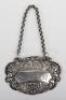 A silver &lsquo;Scotch&rsquo; wine label, Holland, Aldwinckle & Slater, London 1902
