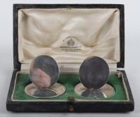 A pair of silver menu holders, London 1927