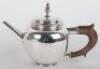 A small sliver teapot, Carrington & Co, London 1904 - 2
