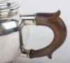 A small sliver teapot, Carrington & Co, London 1904 - 5