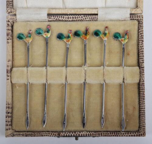 A set of six silver and enamel cocktail sticks, Albert Sydenham, Birmingham 1902