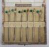 A set of six silver and enamel cocktail sticks, Albert Sydenham, Birmingham 1902