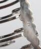 A Georgian silver toast rack, circa 1820 - 9
