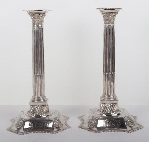 A pair of George II candlesticks, marked WI, London 1752