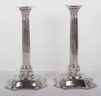 A pair of George II candlesticks, marked WI, London 1752