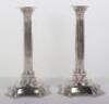 A pair of George II candlesticks, marked WI, London 1752