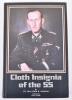 Cloth Insignia of the SS by Angolia, 1st edition, published 1983 by Roger James Bender Publishing. Good condition.