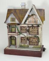 A charming wooden painted dolls house, probably D.H Wagner & Sohn, German 1920s,