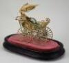 Miniature painted soft metal dolls pram with parasol, German circa 1890,