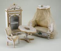 A four-piece set of decorative French miniature furniture, 1880s,