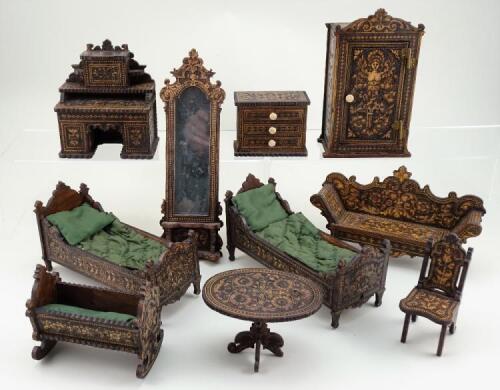 Group of miniature wooden dolls house furniture with carved decoration, German circa 1890,