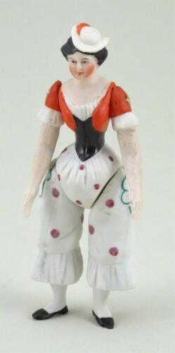 A rare all-bisque Lady with moulded costume, German 1870s,