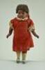 Small bisque head mulatto girl doll, German circa 1905,