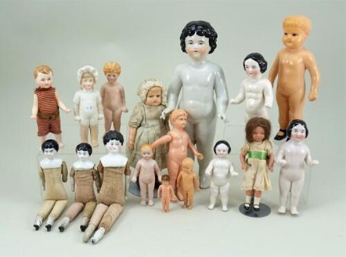 Collection of frozen Charlotte bath and celluloid dolls,