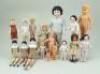 Collection of frozen Charlotte bath and celluloid dolls,