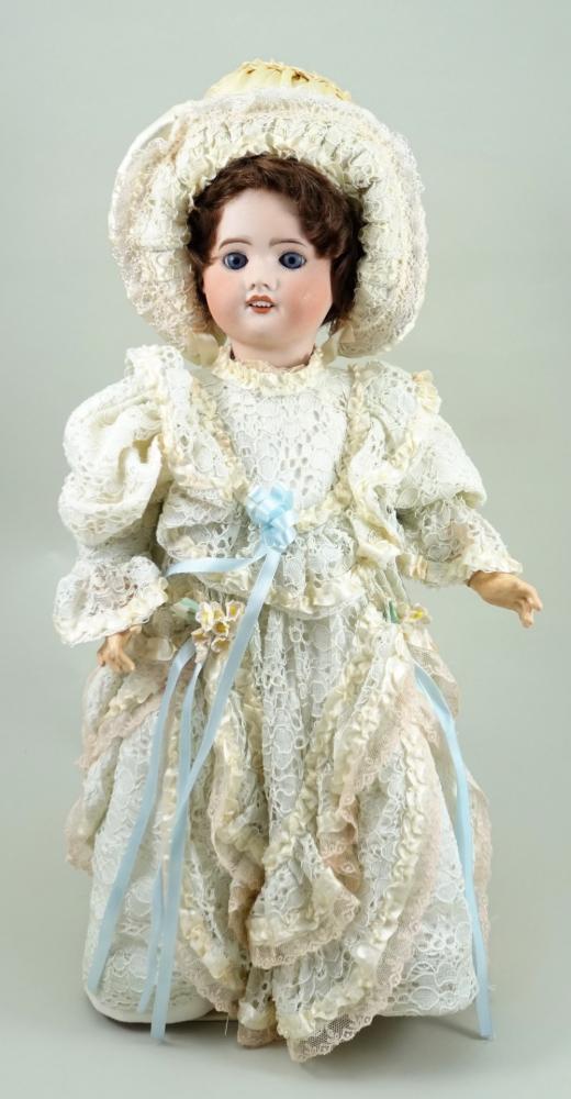 A Henri Rostal Mon Trésor bisque head musical pull-along doll, French circa  1914