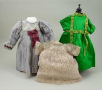 Three dolls dresses,
