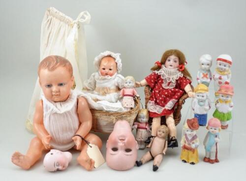 Three dolls, two bisque head and miniature dolls,