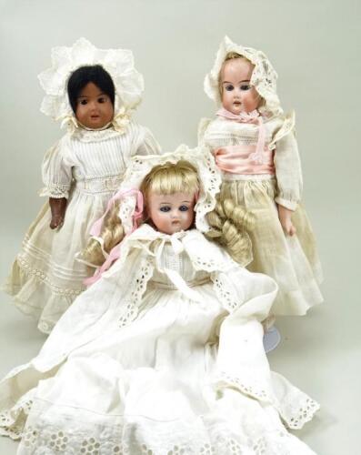 Three small bisque shoulder head dolls, circa 1920,