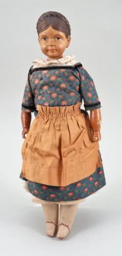 Carved wooden headed child doll by Huggler, Swiss 1920s,