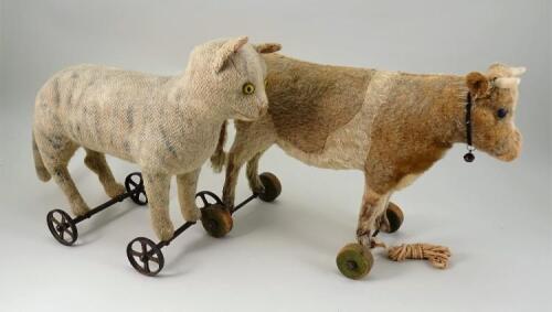 Early Steiff burlap plush Cat on wheels, German circa 1910,