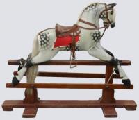 A G&J Lines carved and painted wooden rocking horse, 1920s,