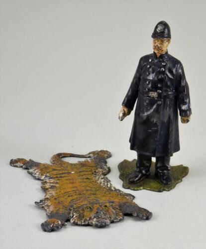 Painted lead Policeman ink well, circa 1900,
