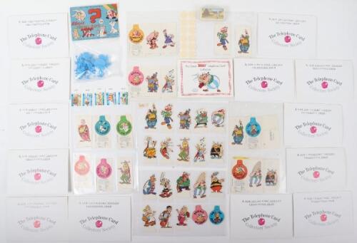 Quantity of Vintage Asterix telephone cards and food related promo items